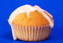 frosted cupcake on blue background