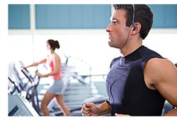 man working out on exercise machine