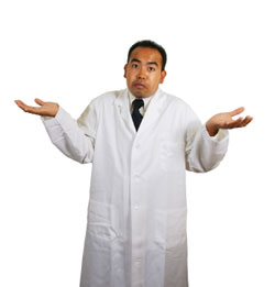 man in white coat with questioning look