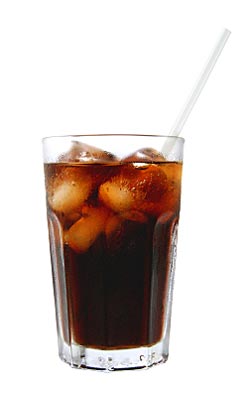 glass of soda with ice and straw