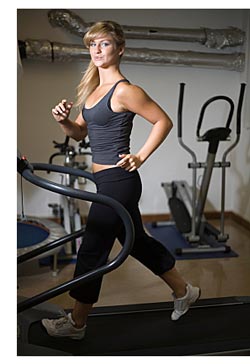 woman working out on treadmill