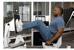 man doing leg press