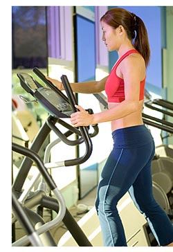 woman on stair stepper machine